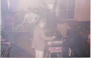 Vintage picture of a DJ doing what he does best